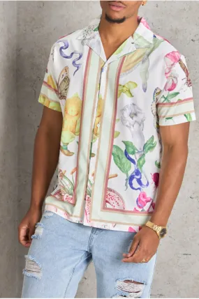 Chemise blanche à motif fleuri et papillon coloré